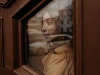 Close-up of a glass of water on a desk.